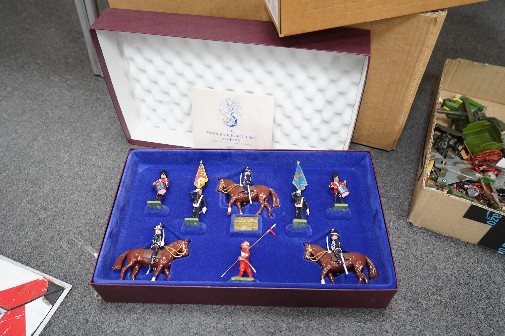A collection of Britains military soldiers, etc, including two boxed Britains military field guns; an 18” Howitzer (No.2107), and a 155mm Gun (No.2064), both with some accessories and shells missing, an unboxed Bren Gun